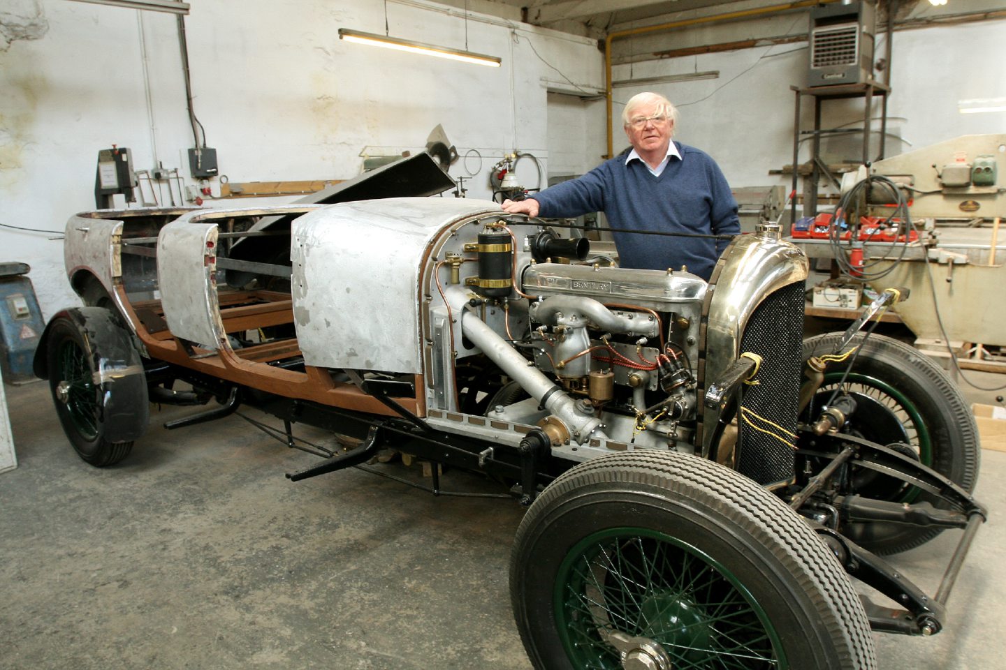 Charles with a 1923, three-litre Bentley under restoration.
