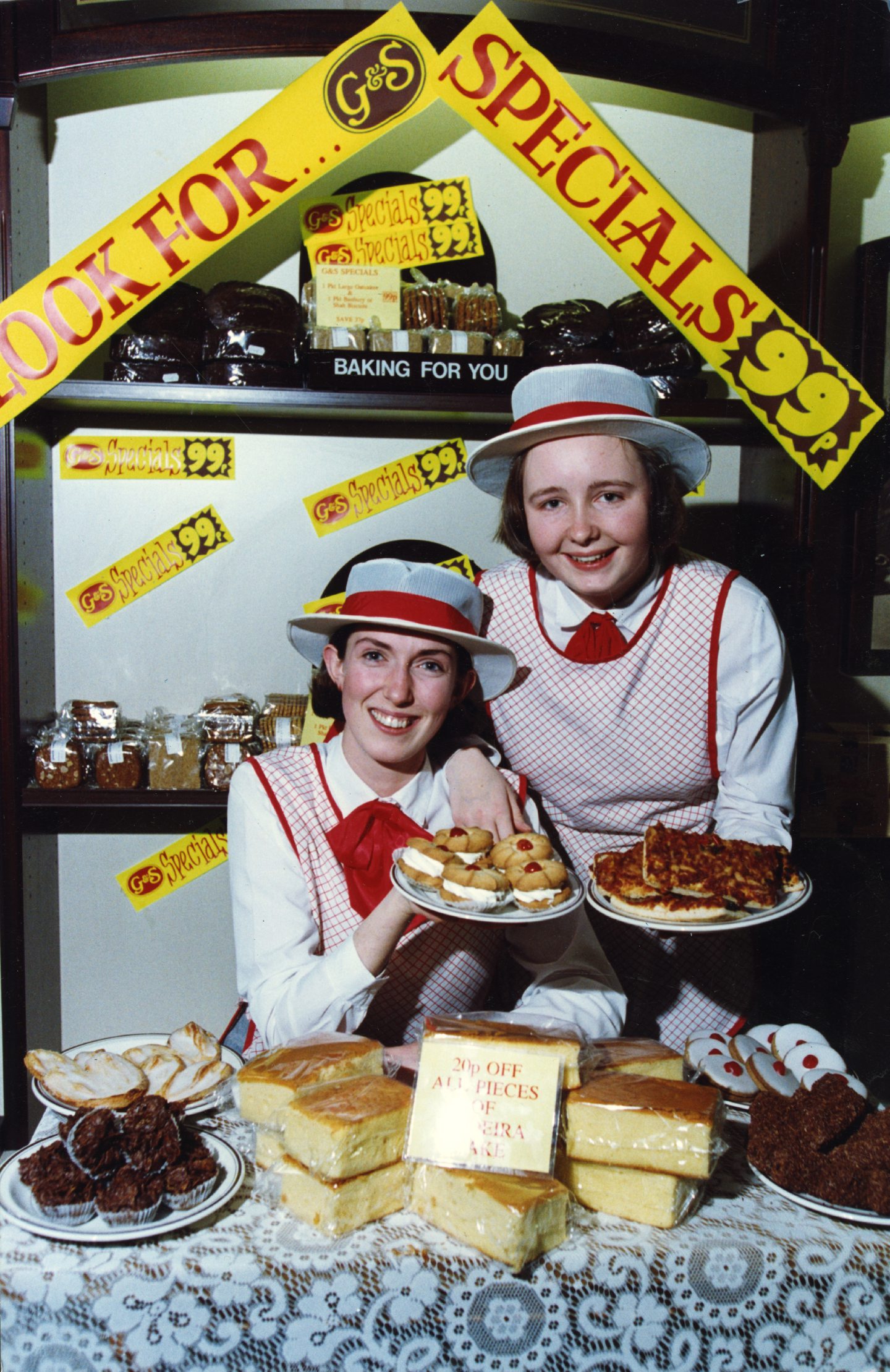 Alison Blackhall and Claire Smith next to a display of cakes. Image: DC Thomson.