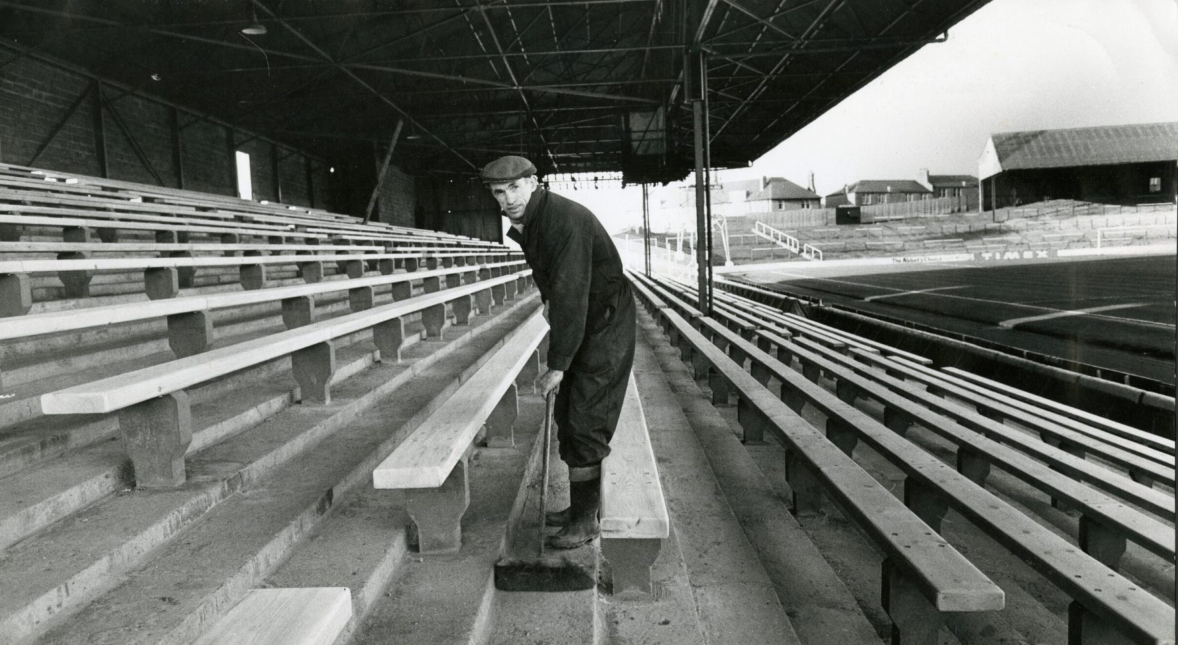 Assistant groundsman William Robertson sweeps the terracing before the League Cup final in 1980. 