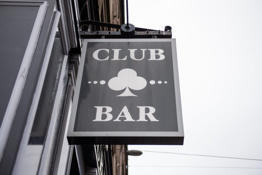 Club Bar sign.