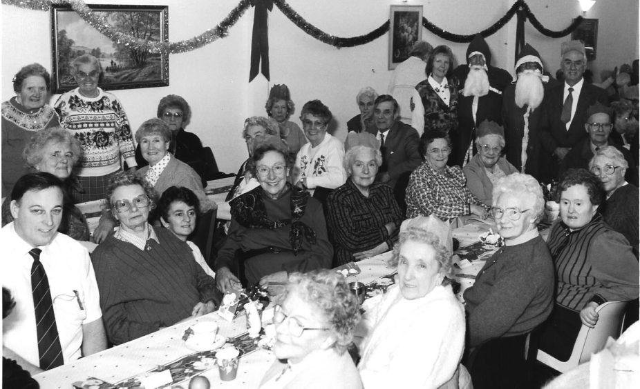 Santa and Santa at the Arbroath Town Mission Christmas party