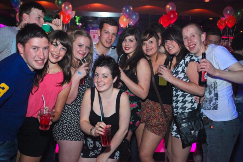 A group pictured on a night out at Fat Sam's in 2012. Image: DC Thomson.