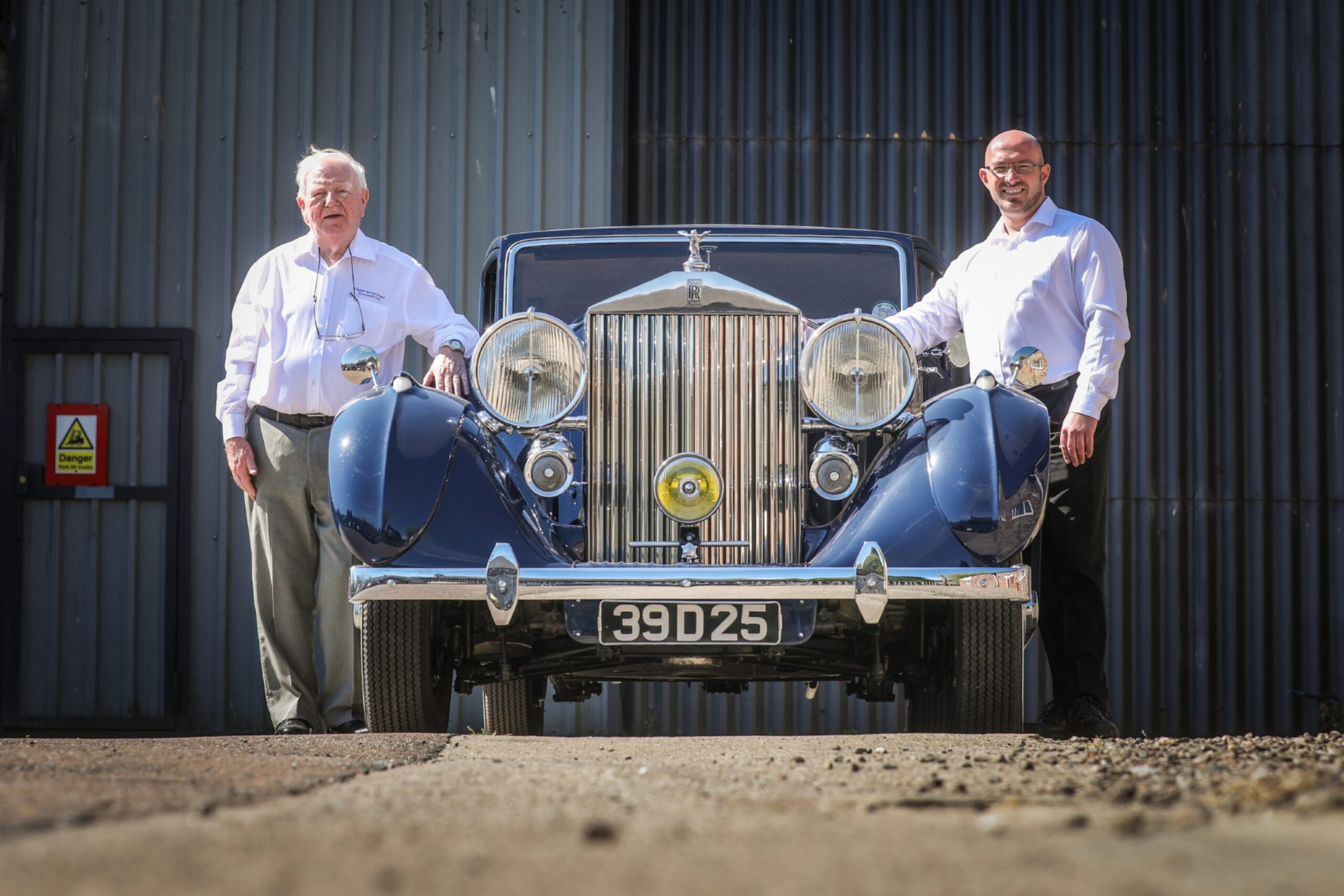 Charles Palmer and managing director Graeme Johnstone with one of their classic cars. 