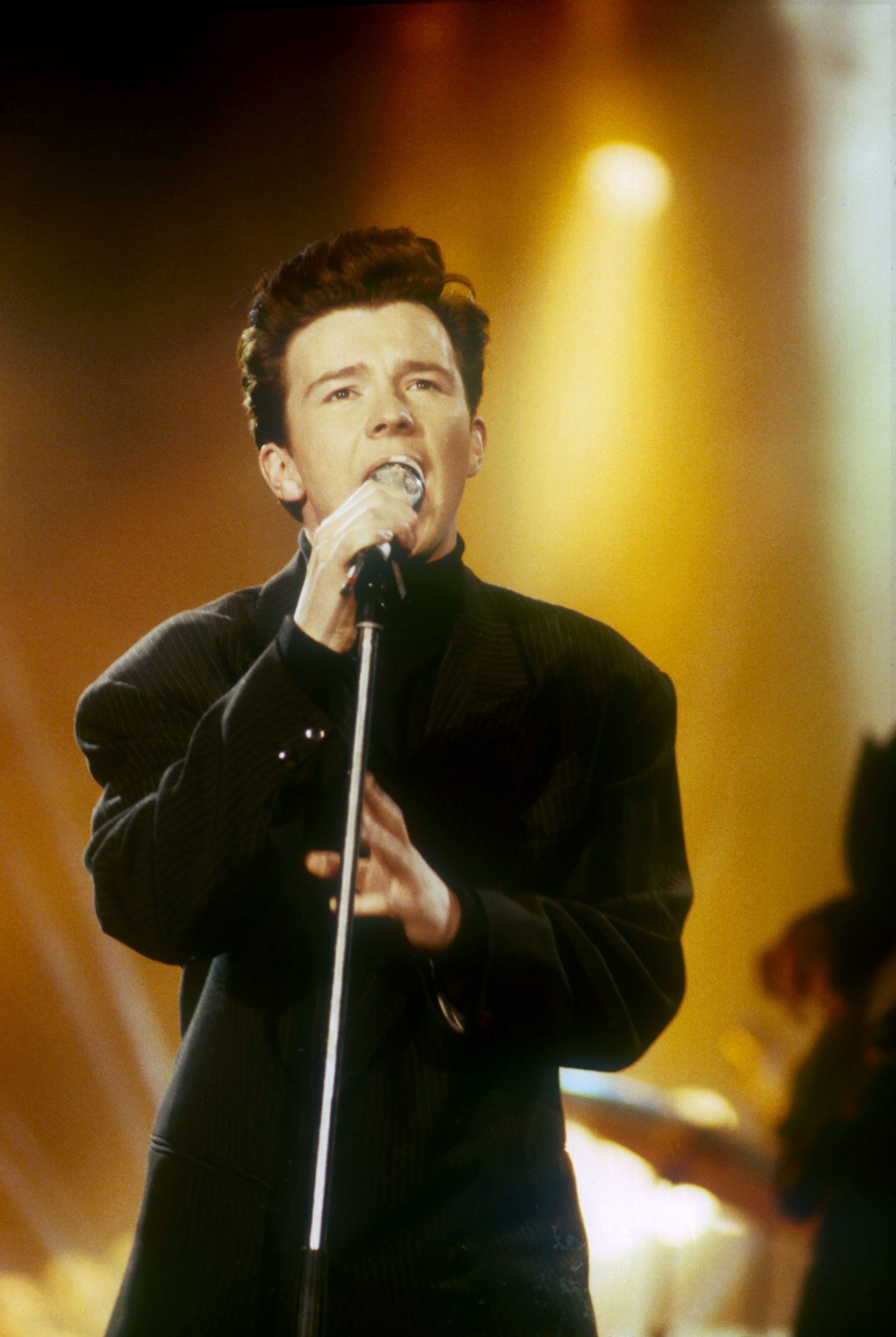 Rick Astley on stage in 1987 when he was riding high in the charts. Image: Shutterstock.