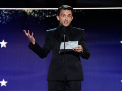 Jonathan Bailey accepts the award for best supporting actor in a limited series or movie made for television for Fellow Travelers during the 29th Critics Choice Awards (AP Photo/Chris Pizzello)