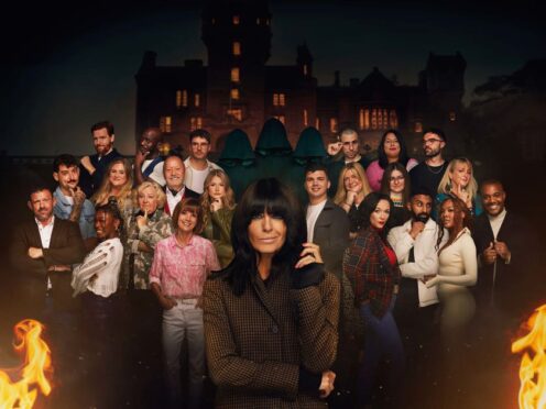 Claudia Winkleman with the contestants in series two of The Traitors (Mark Mainz/Studio Lambert/BBC)