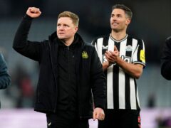 Newcastle manager Eddie Howe, left, and two-goal hero Fabian Schar celebrate victory over Aston Villa (Nick Potts/PA)