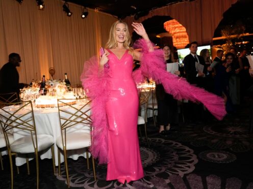 Margot Robbie arrives at the 81st Golden Globe Awards (Chris Pizzello/AP)