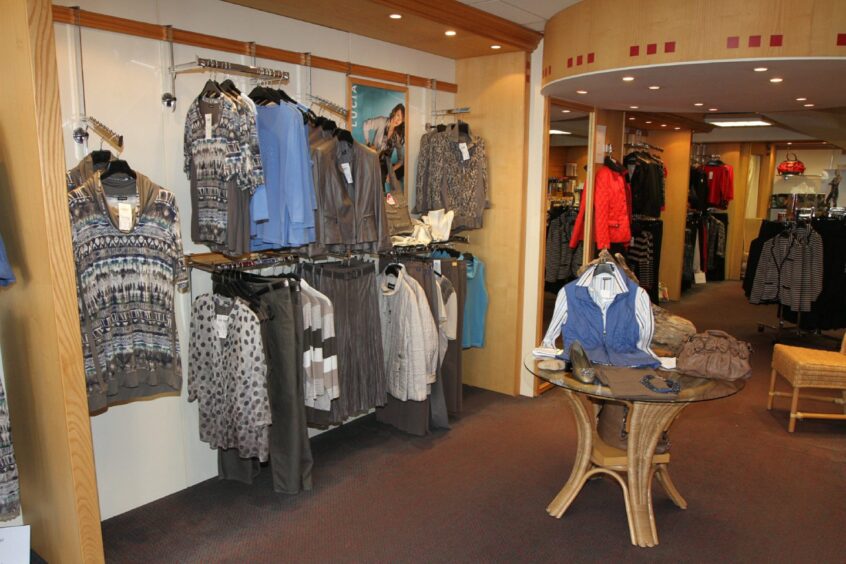 Clothing on display inside Millars