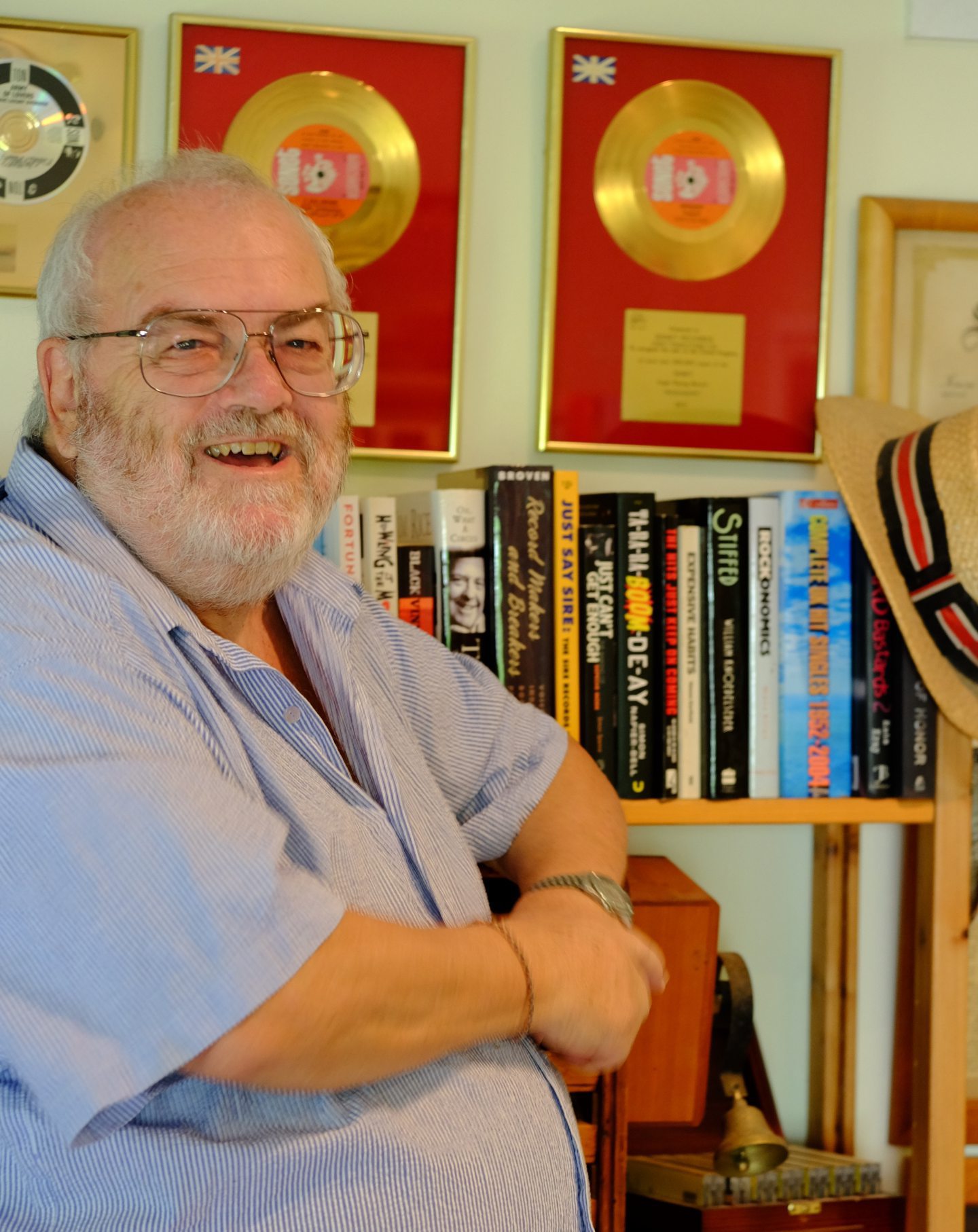 A smiling Harry Buckle, pictured in his home with books and gold discs, has never forgotten his Jackie days. 
