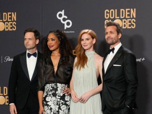 Patrick J Adams, from left, Gina Torres, Sarah Rafferty, and Gabriel Macht pose in the press room at the 81st Golden Globe Awards (Chris Pizzello/AP)