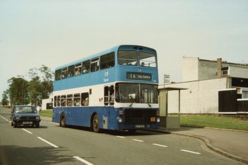 Bus 28, a blue and white Volvo Ailsa, is pictured in Rosemount Road, Dundee, in 1985. 