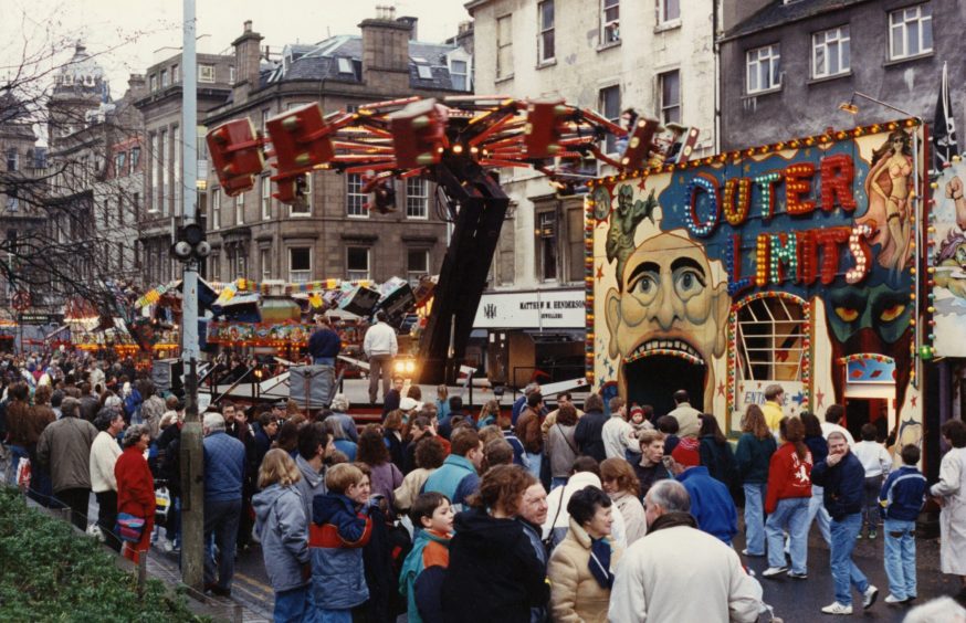A crowd of people enjoy the carnival on Dundee High Street in 1991. 