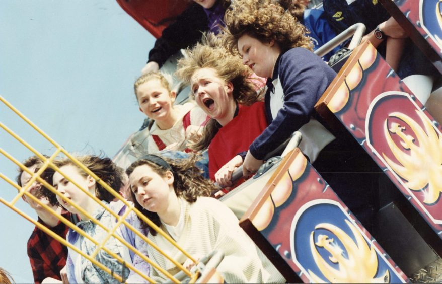 Fun-seekers enjoying a ride on the swing boat at Caird Park in 1991. Image: DC Thomson.