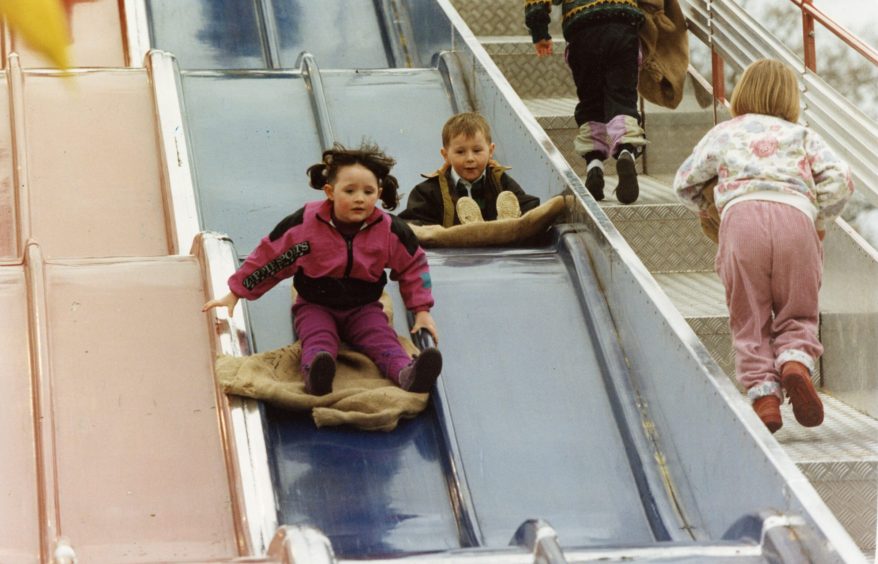 kids having fun on the helter skelter at Caird Park in 1992. 