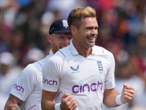 James Anderson, right, made an important breakthrough before lunch for England (Ajit Solanki/AP)