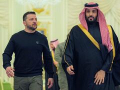 Saudi Crown Prince Mohammed bin Salman, right, accompanies President Volodymyr Zelensky at the Royal Palace in Riyadh (Bandar Aljaloud/Saudi Royal Palace via AP)