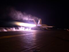 An aircraft launching from USS Dwight D Eisenhower during flight operations in the Red Sea (Kaitlin Watt/US Navy via AP)
