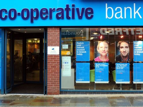 The Co-operative Bank has seen its yearly profit nearly halve (Rui Vieira/PA)