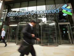 Standard Chartered has become the latest banking firm to post higher profits (Yui Mok/PA)