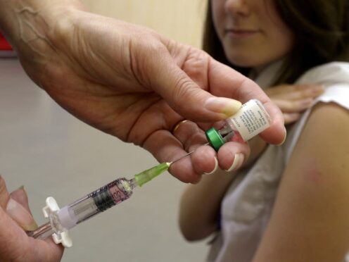 The routine childhood immunisation programme in England offers protection against 13 diseases (Owen Humphreys/PA)