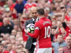 Wayne Rooney (right) would be happy to become Pep Guardiola’s assistant at Manchester City (Martin Rickett/PA)