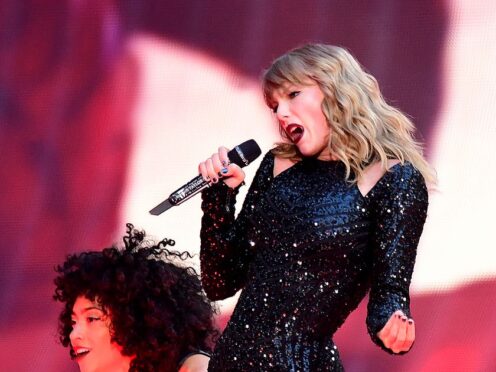 Taylor Swift performs on stage (Ian West/PA)