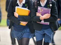 The design of school uniform can affect how much exercise young girls get, a study suggests