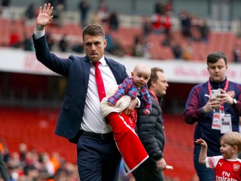Aaron Ramsey bids farewell to the Arsenal fans after agreeing a move to Juventus (John Walton/PA)