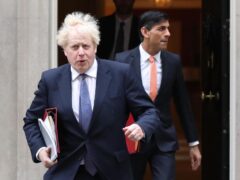 Boris Johnson (left) and Rishi Sunak leave 10 Downing Street in 2020 when they were prime minister and chancellor, respectively (PA)