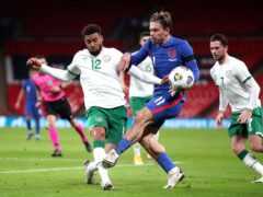 England’s Jack Grealish, right, and Republic of Ireland’s Cyrus Christie battle for the ball (Nick Potts/PA)