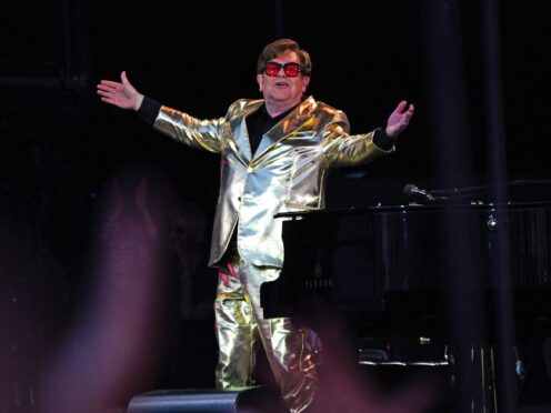 Sir Elton John performing at the Glastonbury Festival in 2023. The singer curated a sale of some of his belongings (Ben Birchall/PA)
