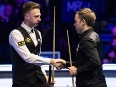 Ali Carter, right, booked his place in the Players Championship semi-final with victory over Judd Trump (Steven Paston/PA)