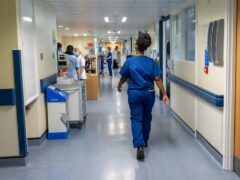 One in three hospital patients in England arriving by ambulance last week had to wait more than half an hour to be handed over to A&E teams (Jeff Moore/PA)