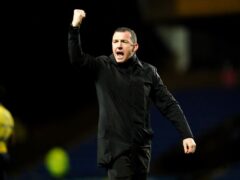 Barnsley manager Neill Collins celebrates after the final whistle in the Sky Bet League One match at the Kassam Stadium, Oxford. Picture date: Tuesday January 23, 2024.