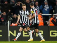 Newcastle’s Harvey Barnes (left) is not giving up on his hopes of another top-four finish (Owen Humphreys/PA)