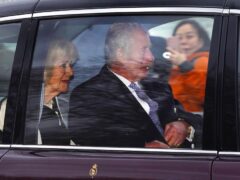 The King and Queen on The Mall after leaving Clarence House following the announcement of Charles’s cancer diagnosis (Victoria Jones/PA)