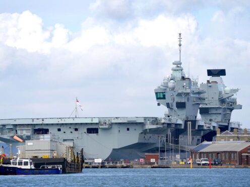 Security minister Tom Tugendhat has said it is ‘not acceptable’ that Royal Navy warship HMS Prince of Wales is sitting in dock when it should be out ‘defending our interests abroad’ (Gareth Fuller/PA)