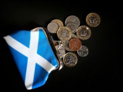 The survey suggests most Scots are tightening their purse strings (Jane Barlow/PA)