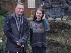 BBC presenter Chris Packham with Cressie Gethin outside Isleworth Crown Court, west London, ahead of her the trial after she climbed an M25 gantry in 2022 (Jonathan Brady/PA)
