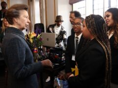 The Princess Royal talks to schoolchildren during a visit to the Off the Streets knife crime community group in Wellingborough, Northamptonshire (Darren Staples/PA)