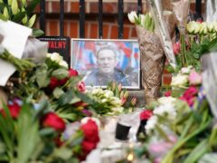 Floral tributes outside the Russian Embassy in London for jailed Russian opposition leader Alexei Navalny following his death (Jordan Pettitt/PA)