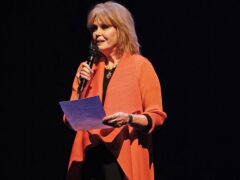 Joanna Lumley reads a poem during the United With Ukraine show, an event for the Ukrainian refugee community in London, to mark two years since the Russian invasion, at the Palace Theatre in London (Aaron Chown/PA)