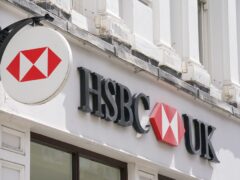 HSBC has unveiled record-high yearly profits and nearly doubled the pay packet for its boss (Lucy North/PA)