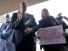 Health Secretary Neil Gray met campaigners outside Parliament (Andrew Milligan/PA)
