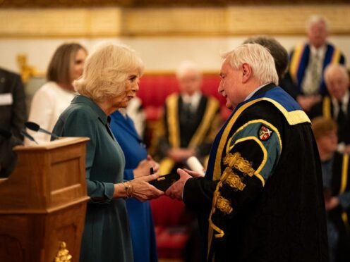 Camilla presents the Queen’s Anniversary Prize to representatives from Scotland’s Rural College (Aaron Chown/PA)