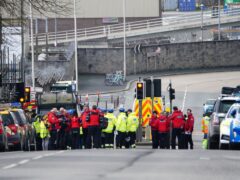 Emergency workers gather in Albert Road near to the Torpoint Ferry crossing in Plymouth (PA)