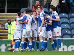 Dominic Hyam (hidden) celebrates with team-mates after scoring Blackburn’s equaliser (Tim Markland/PA)