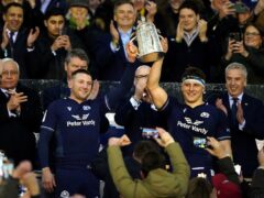 Scotland’s Finn Russell (left) and Rory Darge lift the Calcutta Cup aloft after victory over England (Andrew Milligan/PA)