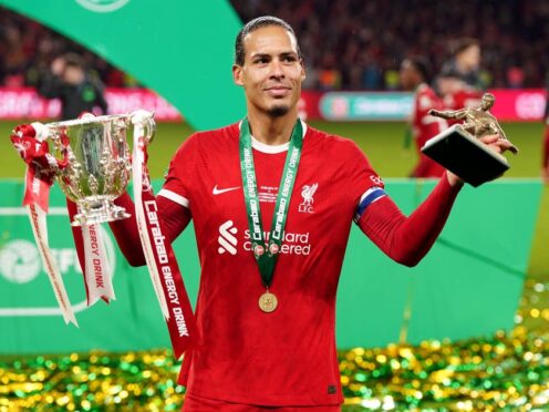 Virgil van Dijk with the trophy after winning the Carabao Cup (Nick Potts/PA)